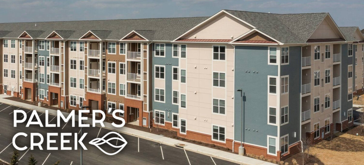 Multifamily building image with the Palmer's Creek logo
