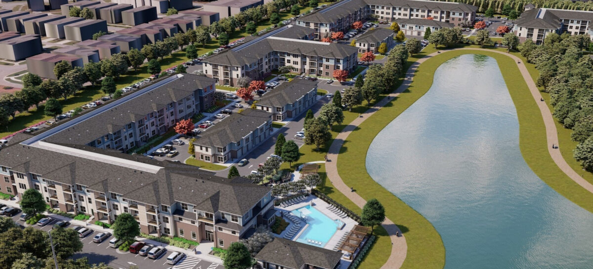 Aerial View of multifamily development with a pool and pond with walking trails
