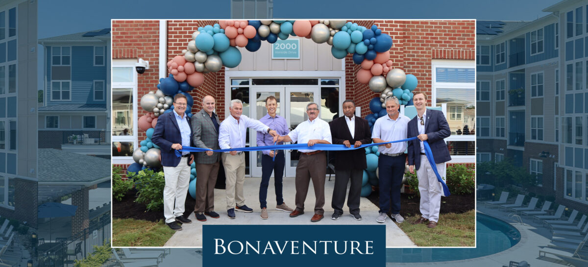 Grand Opening ribbon cutting with balloons and Bonaventure employees