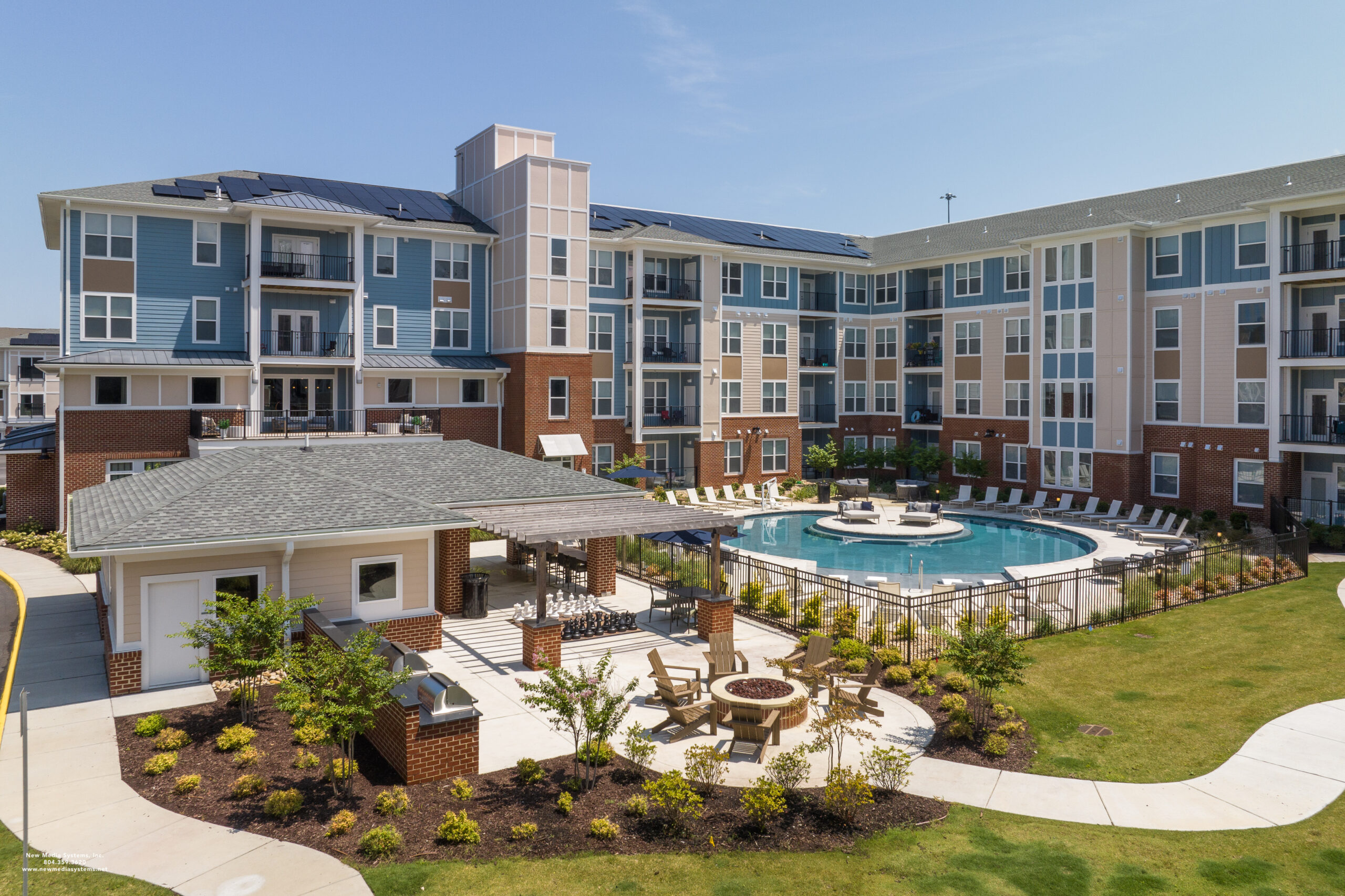 Pool and outer view of multifamily complex